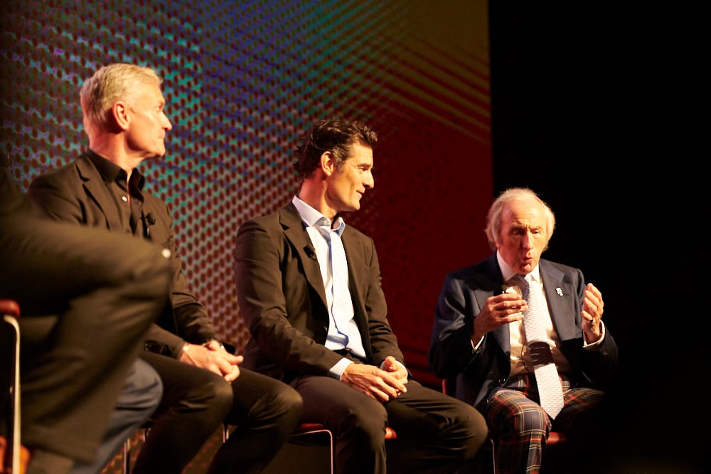 Sir Jackie Stewart hold court with former F1 drivers Mark Webber and David Coulthard